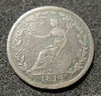 Obverse side of 1814 Canada Half Penny Token showing seated figure with trident, laurel wreath, and date 1814.