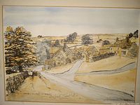 Close-up view of watercolor print showing village houses, road, and trees with signature visible at the bottom.