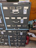 Full front view showing six drawers and handles