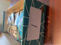 Generic storage box filled with loose hockey cards