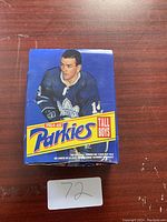 Closed box of 1964-65 Parkies Tall Boys hockey cards with Toronto Maple Leafs player on box