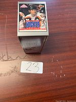 Front view of sealed boxed series showing a player in white jersey on box top.