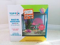 Box of Top Fin 5 gallon glass aquarium tank showing product branding and image of tank setup with artificial plants and fish.