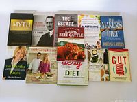 Top view of 10 books arranged in two rows showing all front covers.