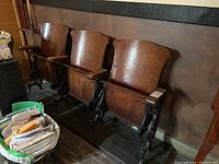 Front view of three seats mounted on plank