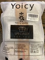 Plastic packaging with Yoicy logo and special gift message, indicates the brand and new sock set