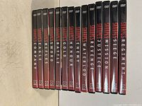 Front view of the set of 14 Sharpe DVD cases aligned to show titles on spine.