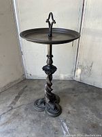 Full standing view showing entire smoking stand with round plate top and intricate dragon base.