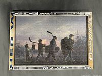 Full view of assembled jigsaw puzzle in custom hockey stick frame measuring approximately 15x21 inches