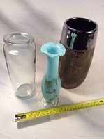Photo showing all three vases together with measuring tape for size reference