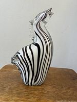Front view of the Murano zebra sculpture showing striped pattern and clear glass accents on mane and tail.