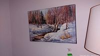 Full frontal view of the unframed winter landscape painting showing snow, trees, and stream.