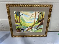 Front view of the gilt framed impressionist landscape watercolor painting showing its overall appearance, colors, and frame style.