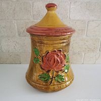 Front view of Laurentian Pottery cookie jar with rose design