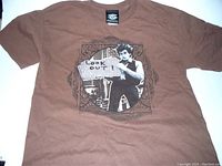 Full view of brown Bob Dylan T-shirt with central graphic print showing Bob Dylan holding a 'Look Out!' sign.