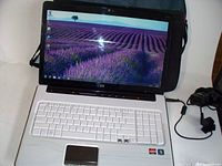HP laptop computer with touchscreen and white keyboard showing two missing keys