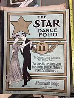 Cover of The Star Dance Folio No. 11 showing a dancing couple and detailed decorative elements.