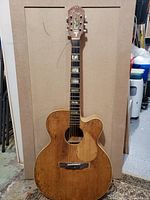 Full front view of Kay acoustic guitar showing body, fretboard and headstock