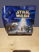 Front view of Micro Machines Star Wars Episode I Collection I set in sealed blister pack showing miniature figures and vehicles with Darth Maul artwork on card