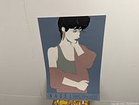 Full view of the vintage Patrick Nagel print showing the subject and signature block