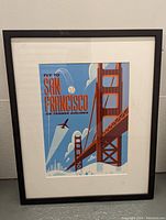 Framed vintage Tanner Airlines travel print featuring Golden Gate Bridge and airplane with text 'Fly to San Francisco'