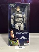 Front view of XL-01 Buzz Lightyear figure in packaging showing figure and branding.