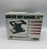 Photo of the retail box showing the product name, features including two-speed massage, personal and clinical treatment, and made in the USA.
