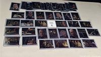 Photo showing a spread of 49 The Sopranos trading cards from 2005 Inkworks featuring various characters and scenes.