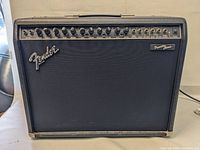 Front view showing grille cloth, Fender logo, Princeton Chorus badge and full control panel.