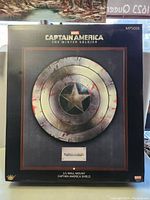 Front view of original display box showing shield artwork and branding