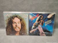 Two Ted Nugent vinyl record albums: Cat Scratch Fever and Weekend Warriors