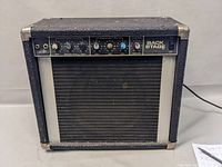 Front view of Peavey Back Stage amplifier showing control panel and speaker grill.