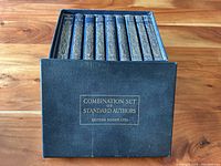 Set of 10 books in dark blue slipcase with gold lettering, showing condition and packaging