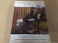 Full front cover of the 1959 Simpsons-Sears Fall and Winter catalog showing a woman dressed in fall fashion.