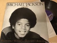 Photo of Michael Jackson Superstar LP vinyl record in its sleeve with the original label visible on the vinyl.