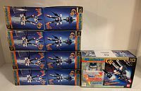 Lot of 9 Bandai MS in Pocket Victory Dash Gundam action figures stacked and arranged, showing mostly front and side box art.