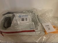 Camelbak Arete 8 sling bag in original plastic packaging showing front and branding details.