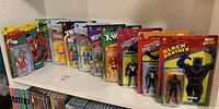Photo of 10 Marvel Legends Kenner 3.75 inch action figures, new on card, featuring characters Falcon, Dazzler, Thor, Wolverine, X-Men, Venom, Spider-Man, and Black Panther.