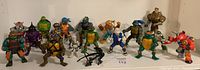 Wide shot showing all 14 Teenage Mutant Ninja Turtles figures including turtles, mutants, robots, and allies with varying conditions.