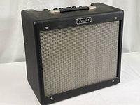 Front view of amplifier showing grille cloth, Fender badge and overall condition