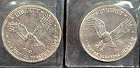 Obverse side of two silver coins showing the Liberty Eagle design with inscriptions of weight and silver purity.