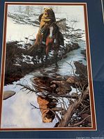 Close-up of the framed print showing detailed artwork of a Native American hunter on horseback near a stream with reflections