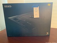 Front of original packaging box shows Wacom Intuos 4 Professional Pen Tablet image and branding