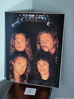 Front view of Metallica poster plaque showing the four band members with the Metallica logo.