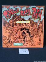 Front cover of the vinyl record showing colorful illustrated cartoon figures and text 'Ponky Reggae Party' along with 'Bob Marley' and 'Disco 45'.