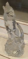 Side view of Lenox crystal wolf figurine showcasing details of the face, ears, and body.