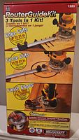 Front of the box showing the Milescraft Router Guide Kit with three tools in one kit, edge cuts, circle cuts and finish edges with images and text describing functionality.