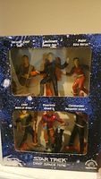 Front view of boxed Star Trek Deep Space Nine figure set showing all six figures labeled with character names