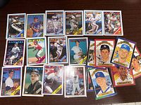Photo showing 18 assorted vintage baseball cards from various Major League Baseball teams and players.