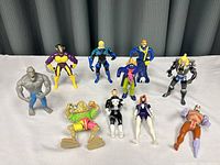 Overview of the 10 action figures grouped together showing full lot.
